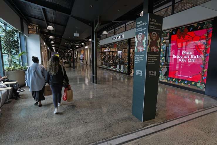 The two-bedroom green villa on Church Street, in Onehunga, Auckland, will be recognisable to Dress Smart shoppers. Photo / Supplied